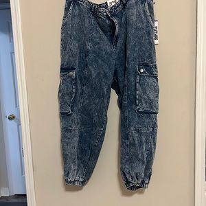 NWT Future Collective acid-washed, tapered leg, mid rise jean.